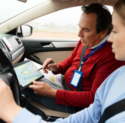 student in driving lesson
