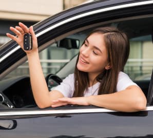 student driving in car